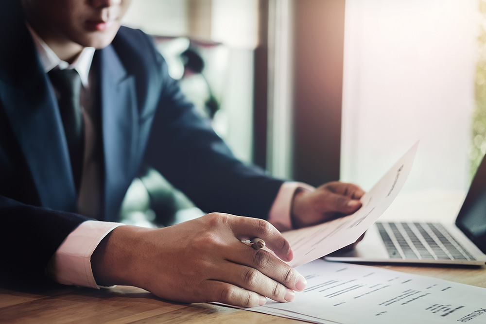 Debt collection lawyer working at his table