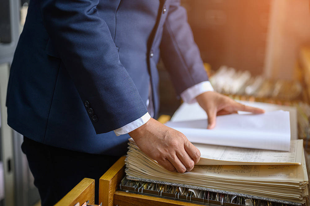Employee looking through files