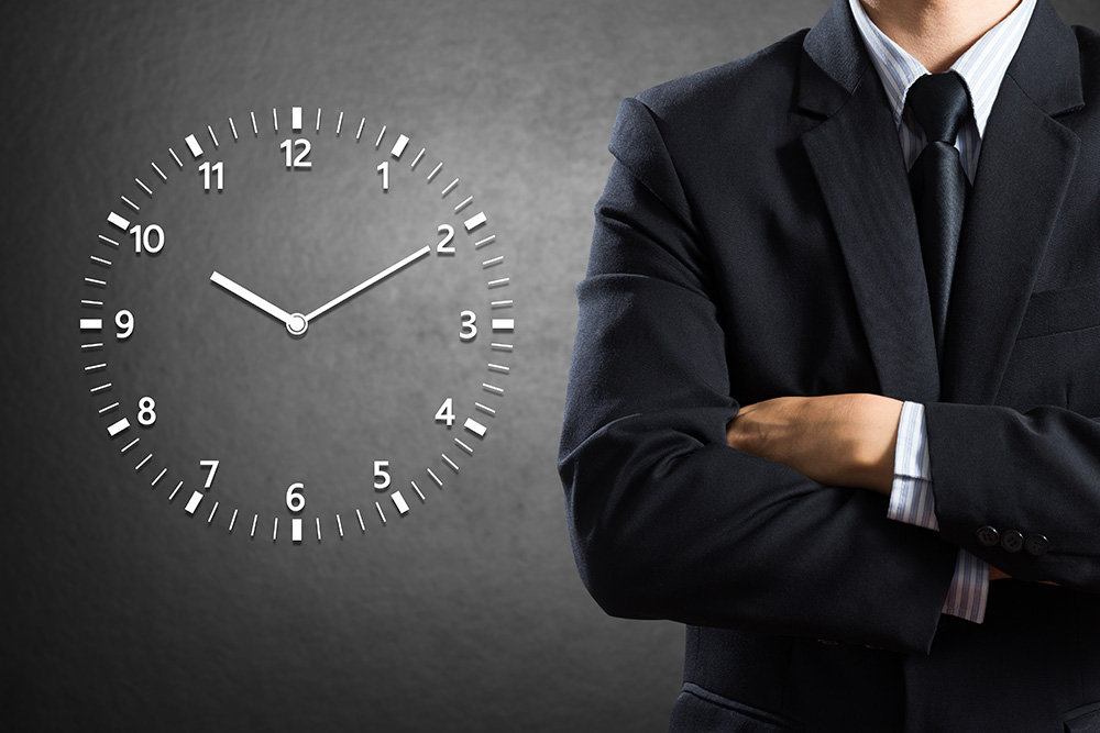 Collection lawyer beside white wall clock