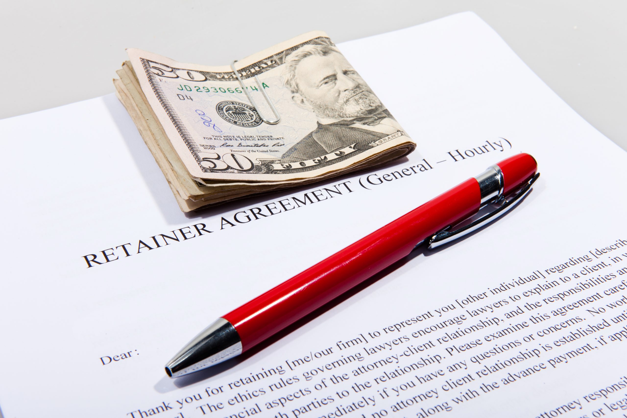 Retainer Agreement with dollars and pen
