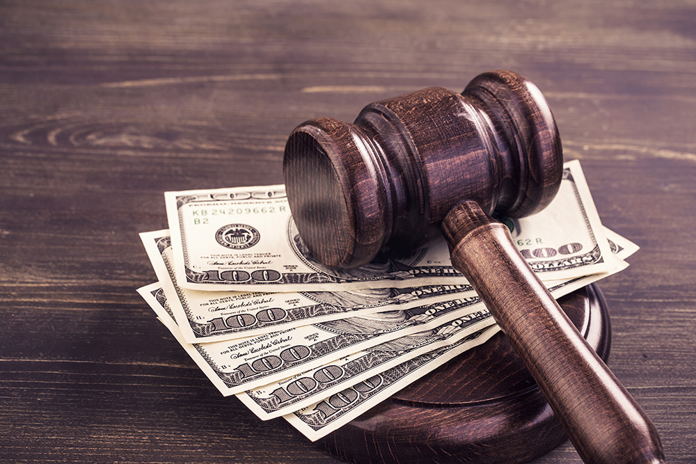Gavel and Money on a Collection Lawyer's Desk
