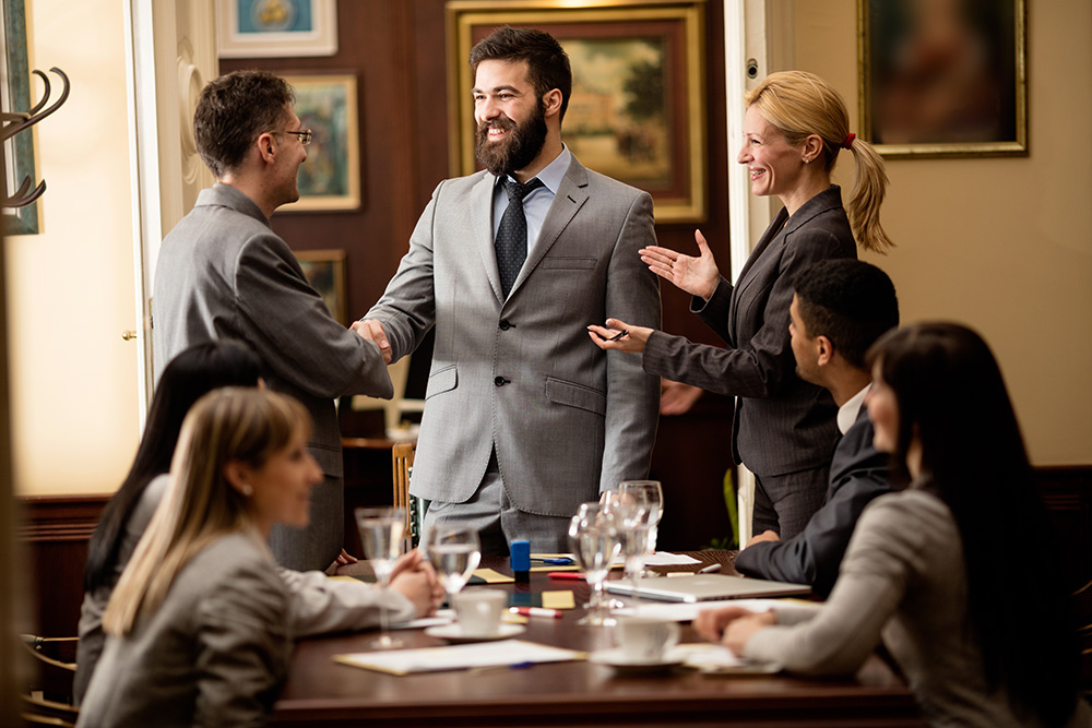 Judgment Enforcement Attorneys with Their Client