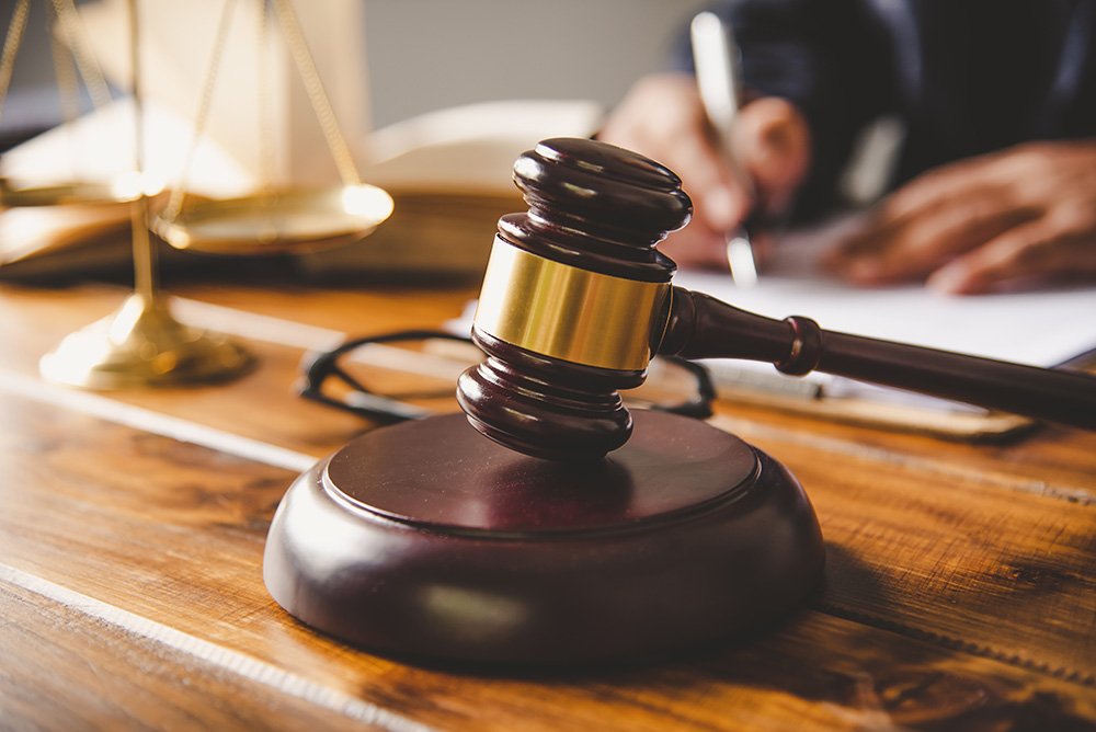 Gavel Sitting on the Table of a Commercial Collection Attorney