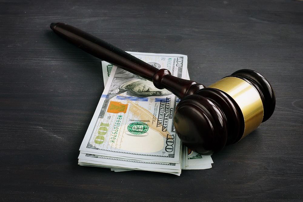 Gavel Sitting Over Money - Debt Collection Attorney Image